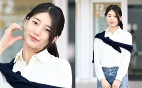 Suzy's white shirt and jeans combo gives pure college freshman vibes—fans say she’s aging in reverse
