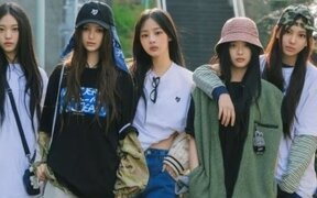 NewJeans' Fandom Divided Over Lawsuit — Truck Protest Outside HYBE Raises Concerns about Massive Financial Penalties