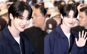 Byeon Woo Seok smiles through airport madness while fans break guard lines again