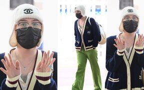 G-Dragon turns heads at Incheon airport as he pulls off bold “frog look” with Chanel beanie and lime green pants before flying to Paris