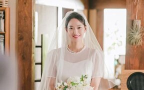 Shin Min Ah looks back at all the wedding dresses she wore in dramas and shares which one stands out most