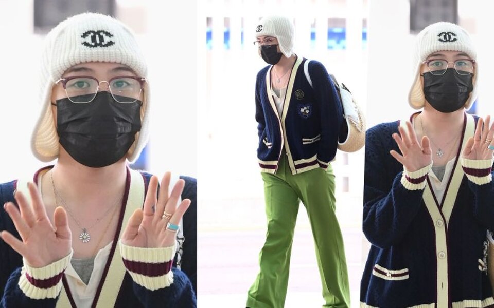 Image for G-Dragon turns heads at Incheon airport as he pulls off bold “frog look” with Chanel beanie and lime green pants before flying to Paris