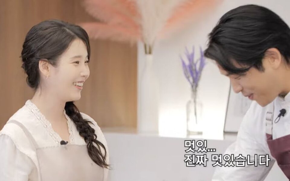 Image for IU surprises Michelin star chef with beautiful hanbok style apron and admits she was more nervous cooking than performing on stage